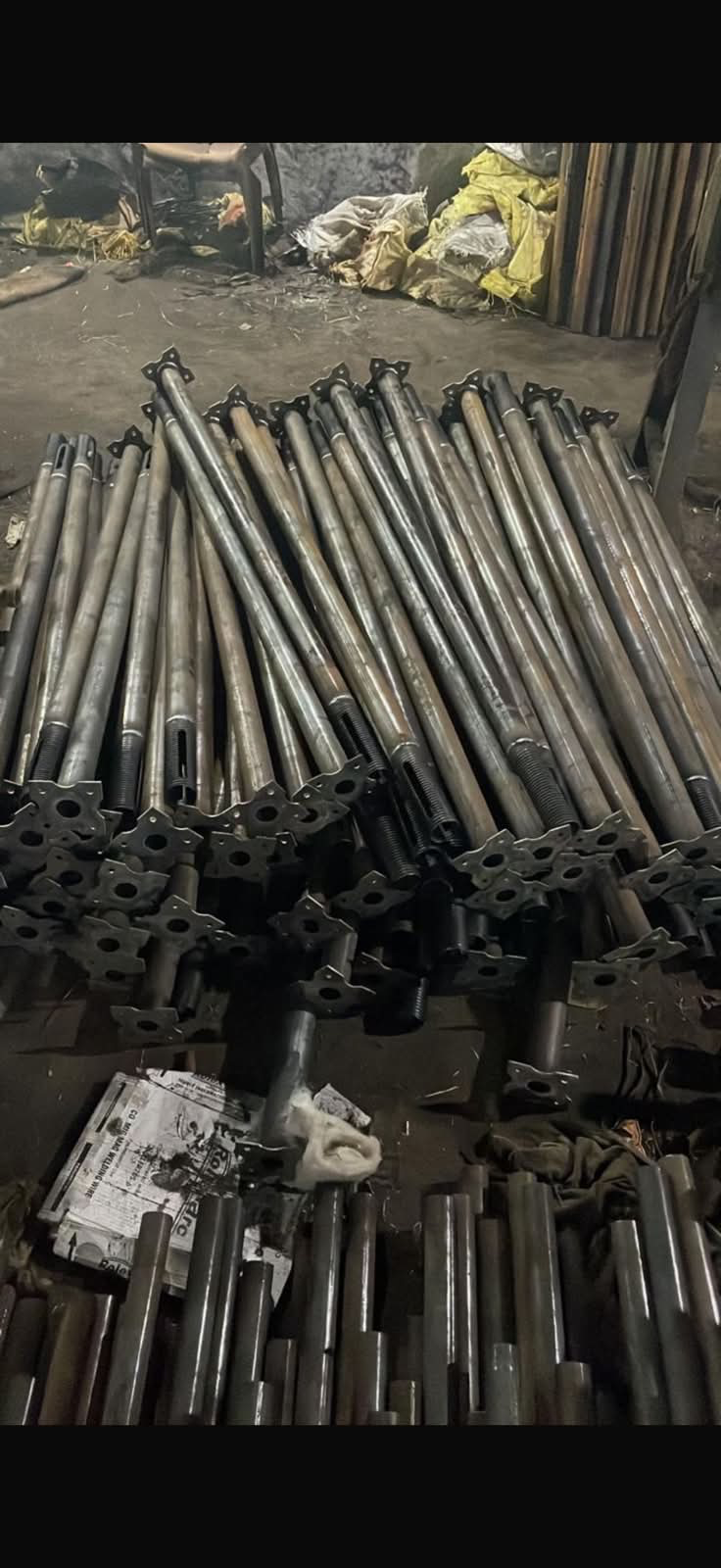 Jacks, props and base jack stock on the facility floor